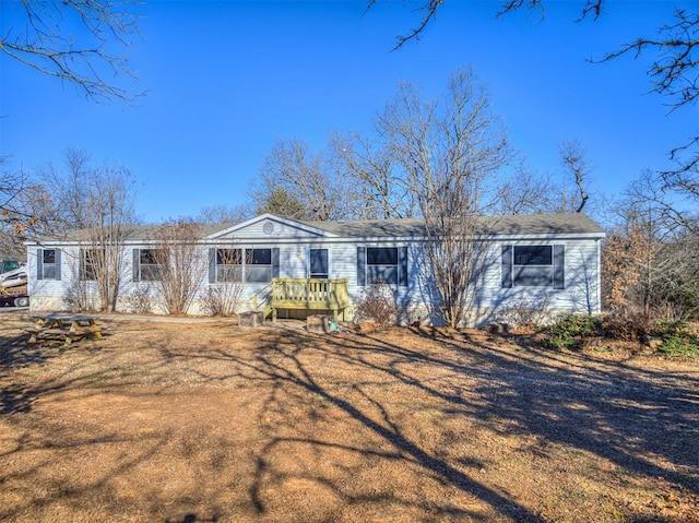 single story home with a deck