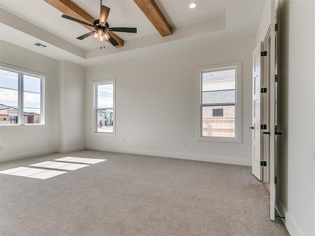 unfurnished room featuring baseboards, beamed ceiling, visible vents, and light colored carpet