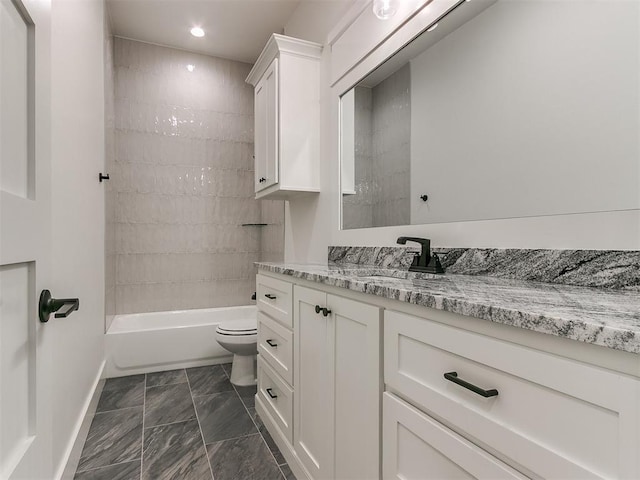 full bath featuring baseboards, toilet, marble finish floor, vanity, and shower / washtub combination