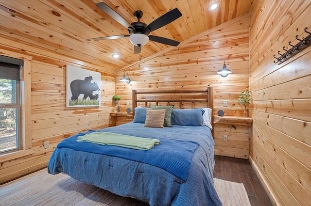 bedroom featuring lofted ceiling, wooden ceiling, wooden walls, hardwood / wood-style flooring, and ceiling fan