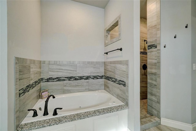 bathroom with independent shower and bath