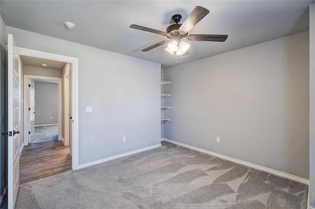 unfurnished bedroom with carpet and ceiling fan