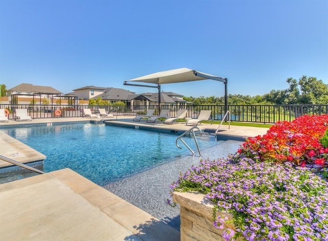 view of swimming pool featuring a patio