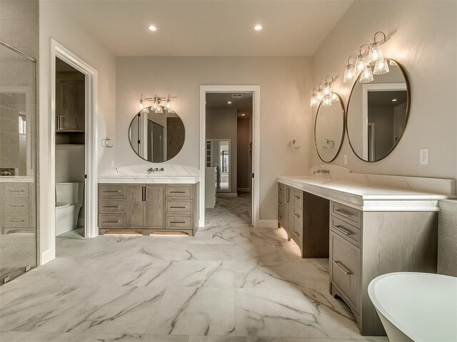 bathroom with a bathing tub and vanity