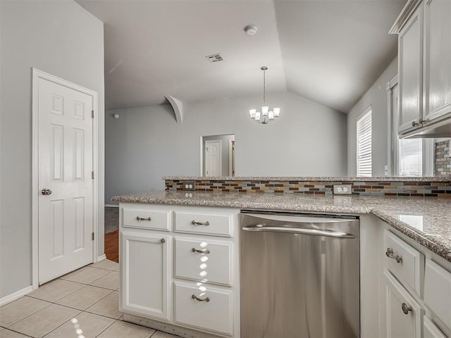 kitchen featuring light tile patterned floors, a notable chandelier, dishwasher, white cabinetry, and lofted ceiling