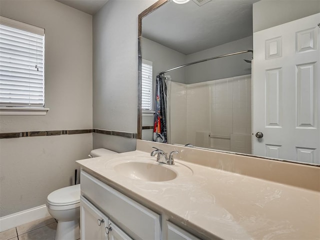 bathroom with tile patterned floors, vanity, toilet, and a shower with shower curtain