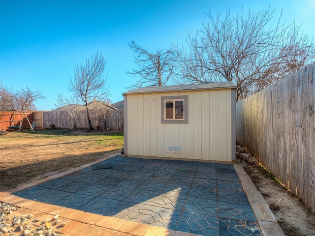 view of outdoor structure with a lawn