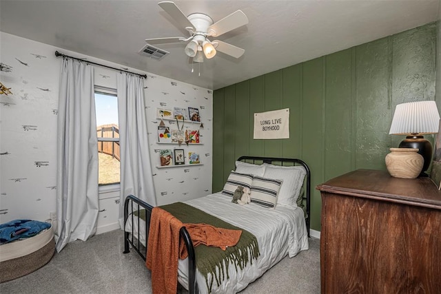 carpeted bedroom featuring ceiling fan