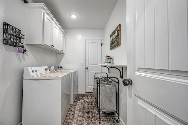 laundry area with cabinets and washer and dryer