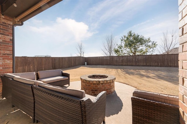 view of patio / terrace with a fire pit