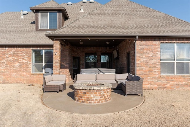 back of property featuring a patio area and an outdoor hangout area