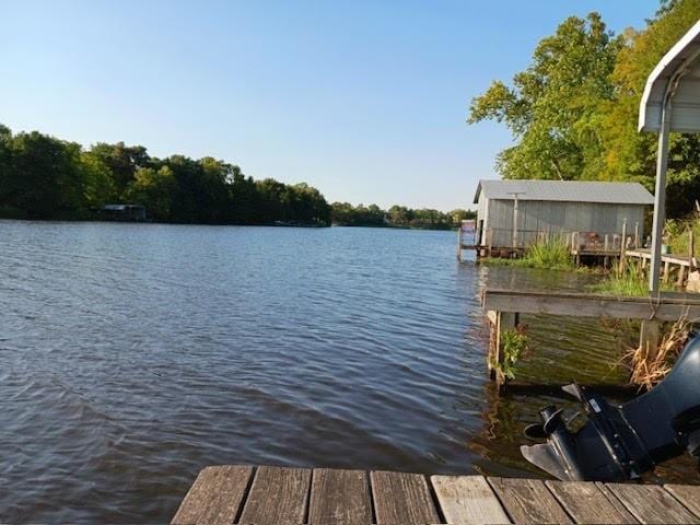 view of dock featuring a water view