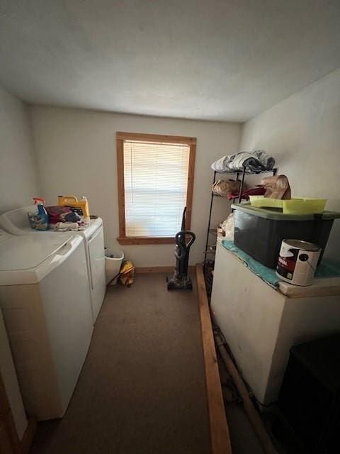 laundry room featuring carpet floors and washer and dryer