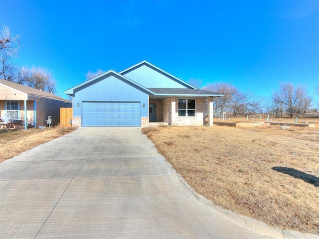 single story home featuring a garage