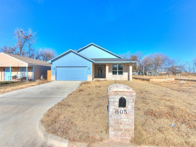 ranch-style house featuring a garage