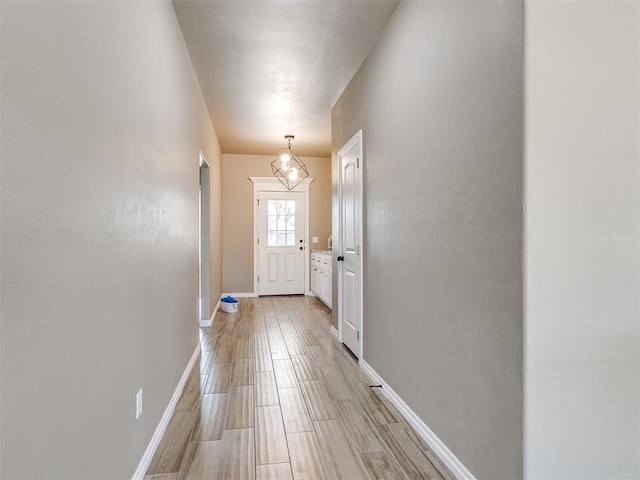 doorway to outside with light hardwood / wood-style floors