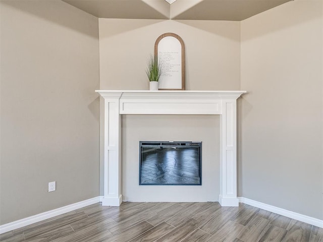 interior details featuring hardwood / wood-style floors