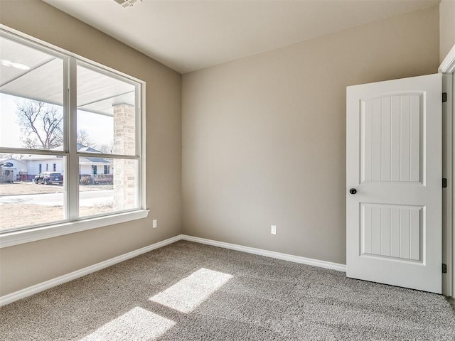 empty room featuring carpet floors