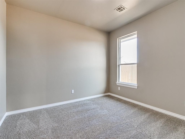 spare room with carpet flooring