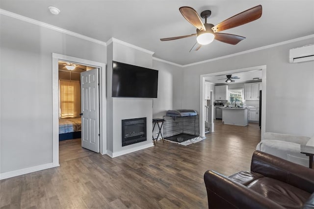 living room with sink, crown molding, dark wood-type flooring, and a wall unit AC