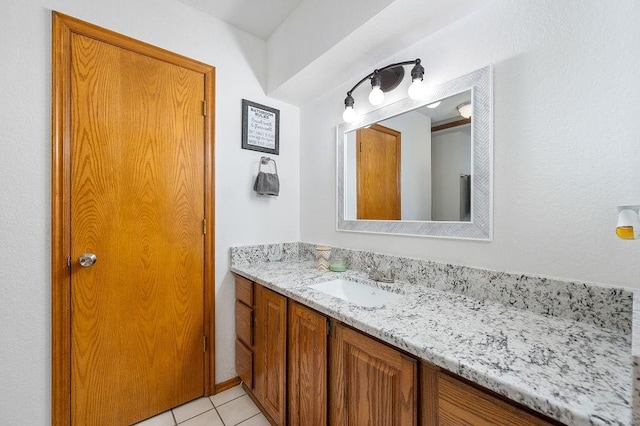 bathroom featuring vanity and tile patterned floors