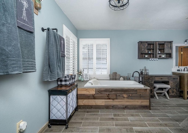 bathroom with a washtub