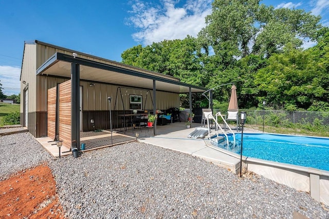 view of pool with a patio area