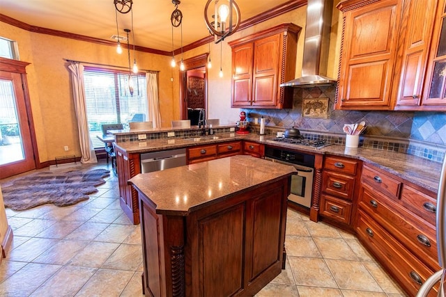 kitchen featuring a center island, hanging light fixtures, wall chimney range hood, kitchen peninsula, and appliances with stainless steel finishes