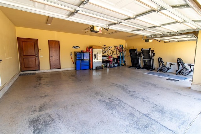 garage featuring a garage door opener