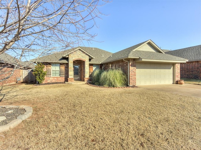 ranch-style home featuring a garage