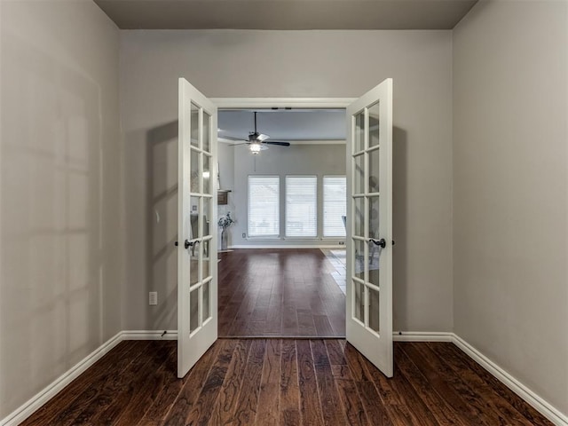 unfurnished room with ceiling fan, french doors, and wood-type flooring