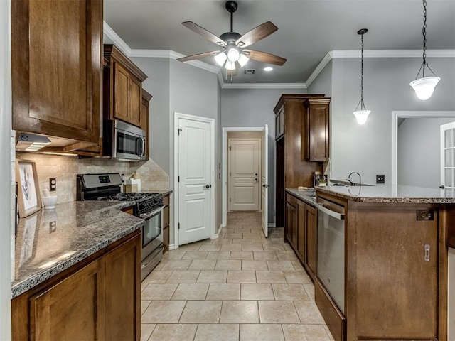 kitchen with ceiling fan, stainless steel appliances, tasteful backsplash, light tile patterned flooring, and ornamental molding