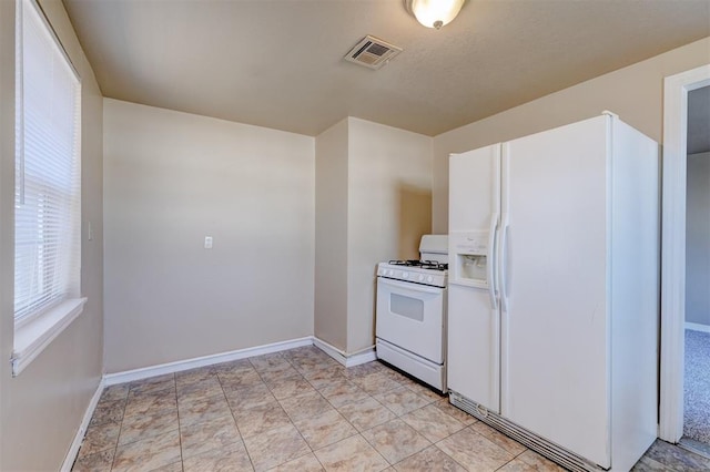 kitchen with white appliances