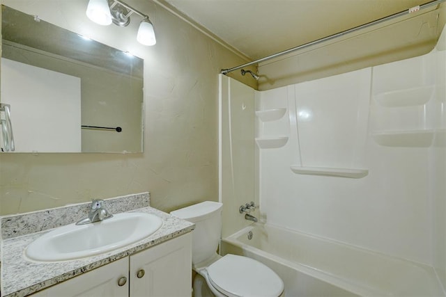 full bathroom with vanity, toilet, and washtub / shower combination