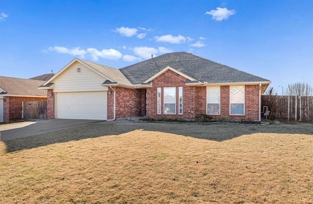 ranch-style home featuring a front lawn and a garage