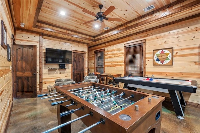 recreation room with ceiling fan, wood ceiling, wooden walls, and a tray ceiling