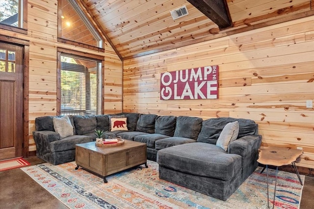 carpeted living room with visible vents, wood walls, lofted ceiling, and wood ceiling