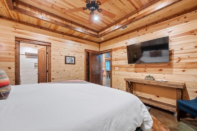 bedroom with visible vents, wood ceiling, a raised ceiling, and wooden walls