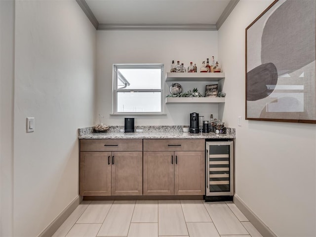 bar with crown molding, wine cooler, and light stone countertops