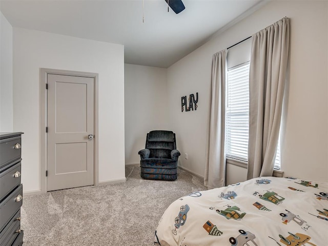 bedroom with ceiling fan and light colored carpet