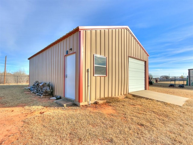 view of outbuilding featuring a garage