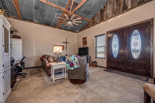 entrance foyer featuring ceiling fan and high vaulted ceiling