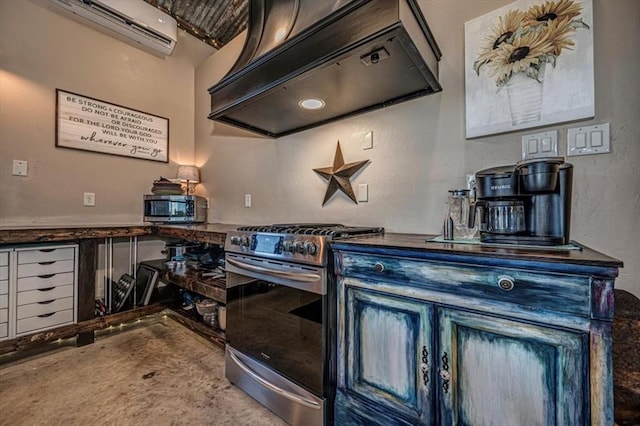 kitchen featuring concrete flooring, appliances with stainless steel finishes, a wall unit AC, and custom range hood