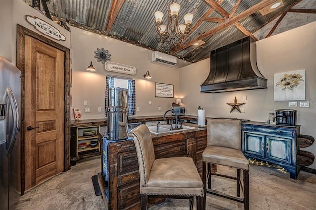 sitting room with sink, a wall mounted air conditioner, high vaulted ceiling, a notable chandelier, and concrete floors