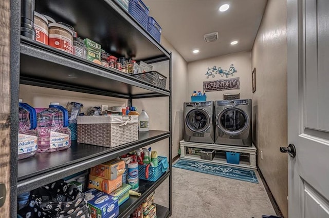 washroom featuring independent washer and dryer