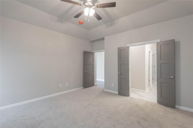 1300 Colonial Ave, Tuttle, OK 73089 - unfurnished bedroom with ceiling fan and light carpet