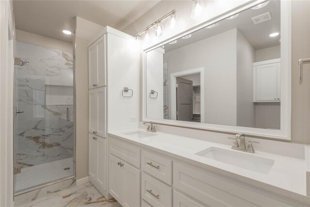 1300 Colonial Ave, Tuttle, OK 73089 - bathroom featuring vanity and a shower with shower door