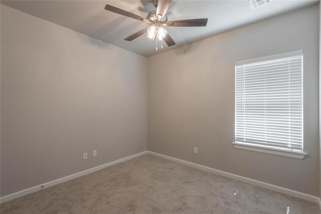 1300 Colonial Ave, Tuttle, OK 73089 - carpeted spare room featuring ceiling fan
