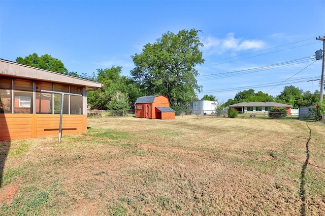 view of yard with a storage shed