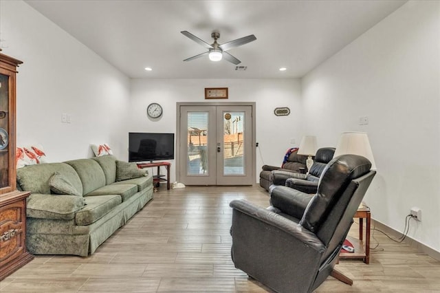 1305 Katelyn Ct, Yukon, OK 73099 - living room with a ceiling fan, recessed lighting, light wood-style floors, and french doors